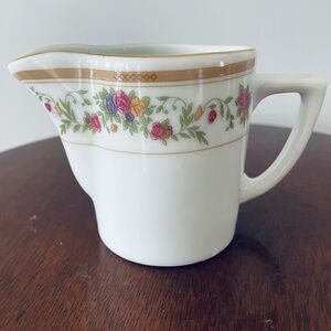 Vintage White Porcelein creamer with floral pattern and gold trim by Farberware,